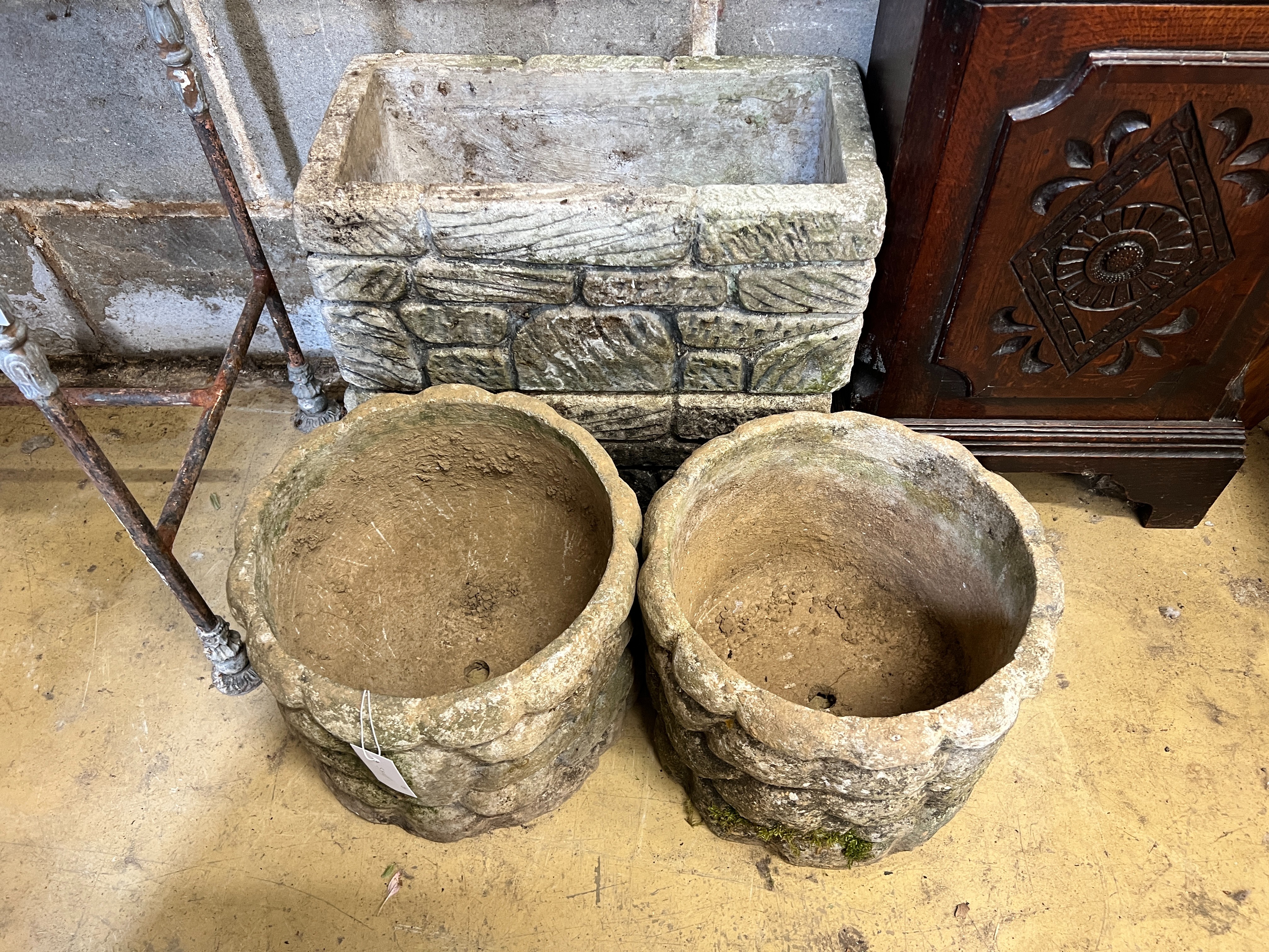 A pair of circular reconstituted stone garden planters, diameter 31cm, height 25cm together with a pair of rectangular planters